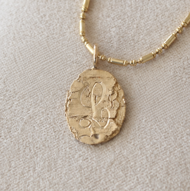 Gold Birch Oval Pendant hand-engraved with an initial