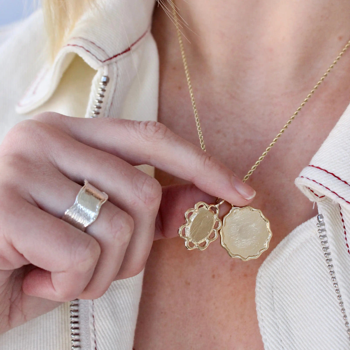 Modern heirloom gold disc pendants, hand carved and made to order by Mary Frances Maker